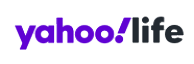 Yahoo! Life logo with the word yahoo! in bold purple letters and life in bold black letters on a light gray background.