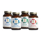 Four brown supplement bottles from Pure Synergy’s Longevity Bundle are arranged in a row, labeled Eye Protector, Bone Renewal, Cell Protector, and Heart Protector, each with distinctive colored accents and detailed product information.
